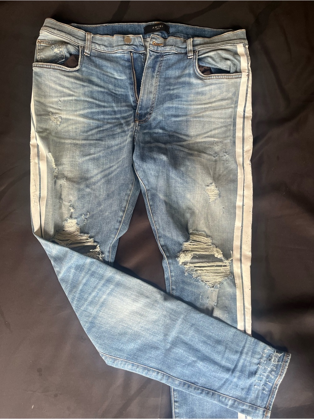 AMIRI Light Blue Distressed Skinny Jeans with White Side Stripes